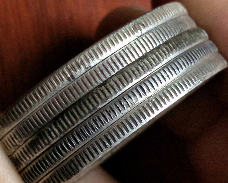 1分钟,教你从袁大头的边齿,判断银元真伪_腾讯新闻