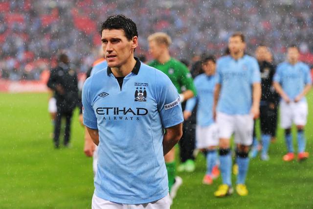 中场铁汉加雷斯巴里英超球坛中的低调传奇