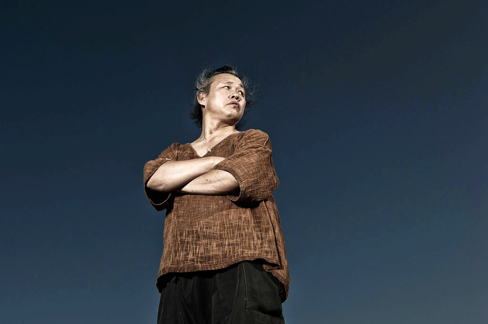 金基德的人生,就是一场毁誉参半的电影_腾讯新闻