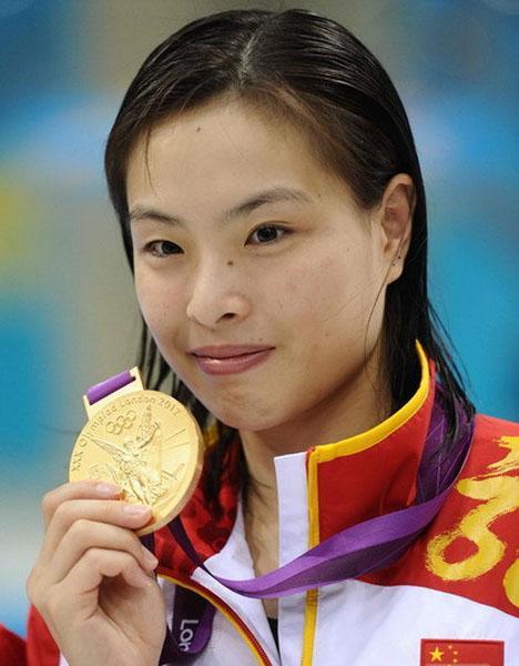 中国最传奇女跳水奥运冠军,4届奥运会夺5金,今35岁家庭美满_腾讯新闻