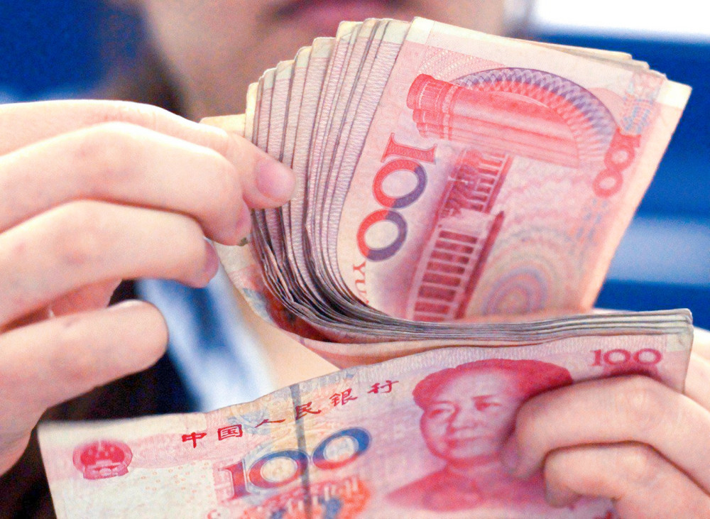 越南怪象街头常摞着大捆人民币却没人敢动