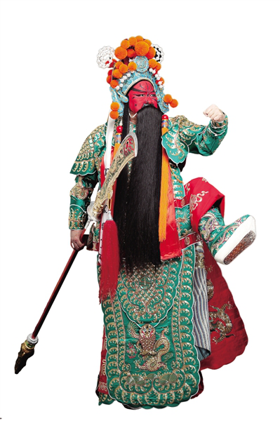 在戏剧表演形象中为何送给关公一身绿色装扮