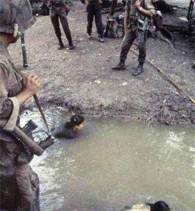 越战老照片战士被处决前宁死不屈图4被俘虏的女兵惨不忍睹