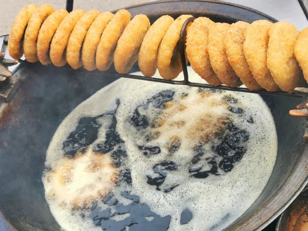 仪陇街头美味名小吃——油干儿,你吃过吗?_腾讯新闻