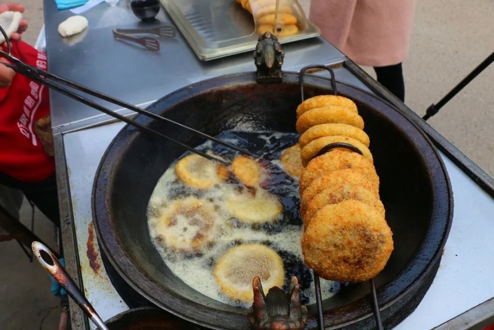 仪陇街头美味名小吃——油干儿,你吃过吗?_腾讯新闻