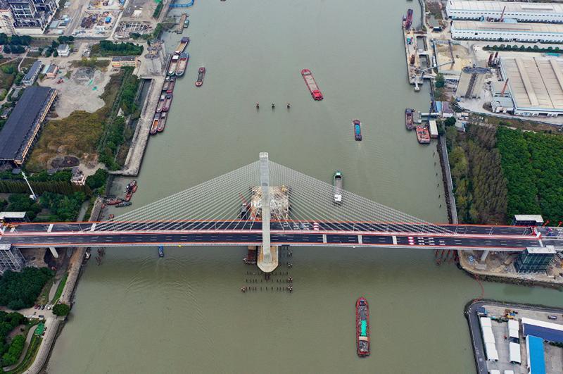 三桥)主线建成并开放交通,标志着闵浦二桥和松浦大桥之间长达10公里