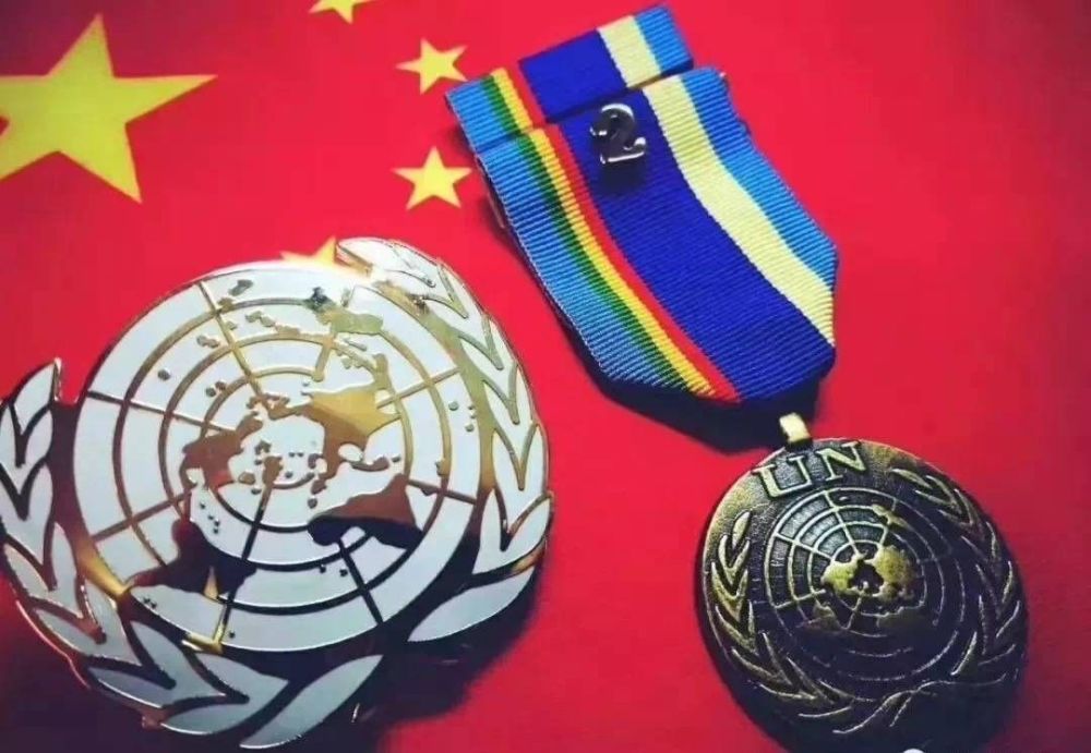 图为联合国勋章中国是一个热爱和平的国家,中华民族也是一个热爱和平