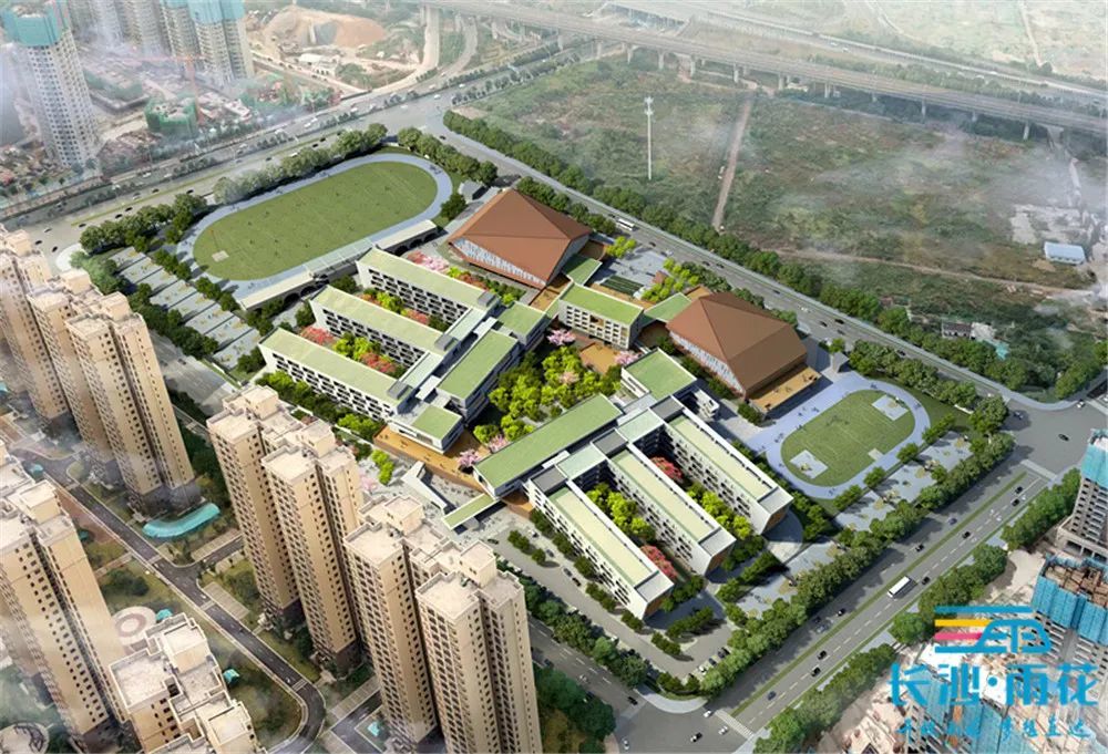 走进万科川河学校项目施工现场,只见塔吊来回转动,不停地运送材料