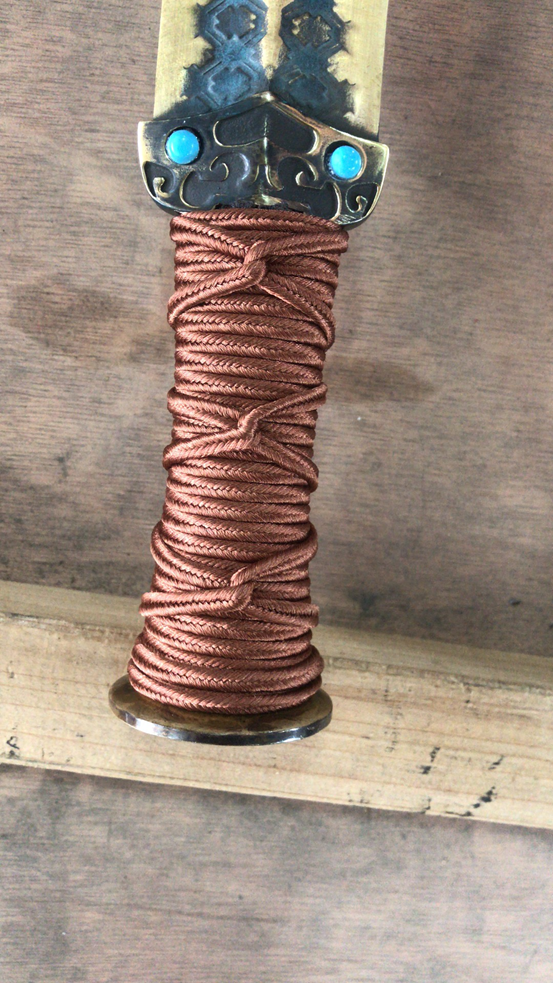 龙泉宝剑为什么龙泉宝剑厂的越王剑柄上是有绳子的