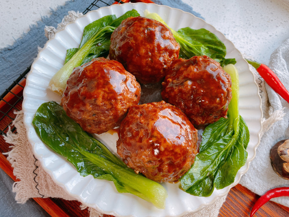 年夜饭必备的四喜丸子,寓意福禄寿喜,家庭做法更简单,肉香四溢_腾讯