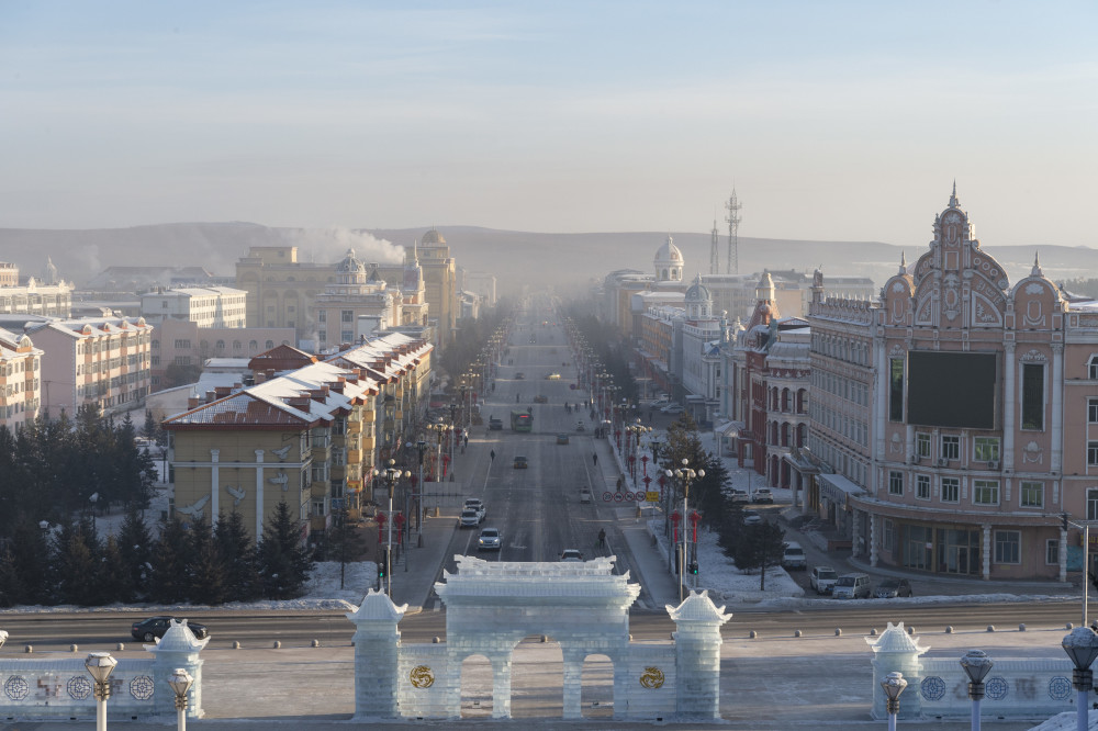 新华社记者探寒极图文互动零下40的小城漠河剪影人流依旧街摊照摆工作