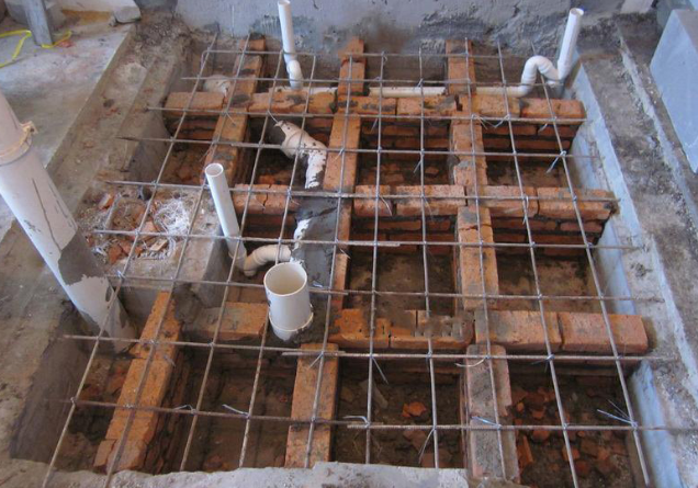 下沉式卫生间装修时做架空还是回填有什么分别哪一种更好