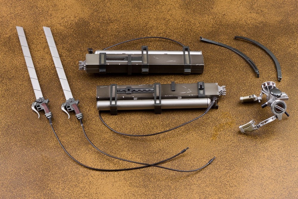 立体机动装置的构造十分复杂立体机动装置的使用:按下刀柄的扳机后