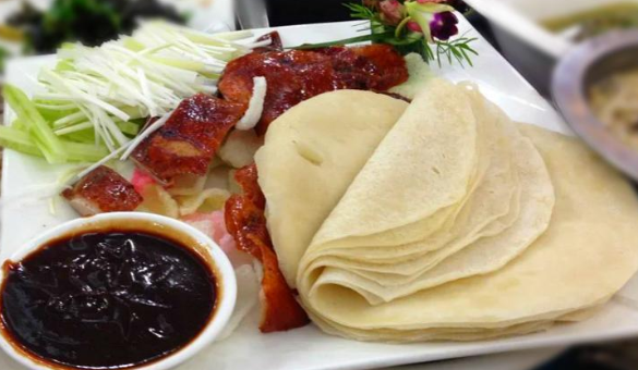 北京烤鸭店的"鸭饼"kfc的老北京鸡肉卷,墨西哥鸡肉卷但是中国中部以及