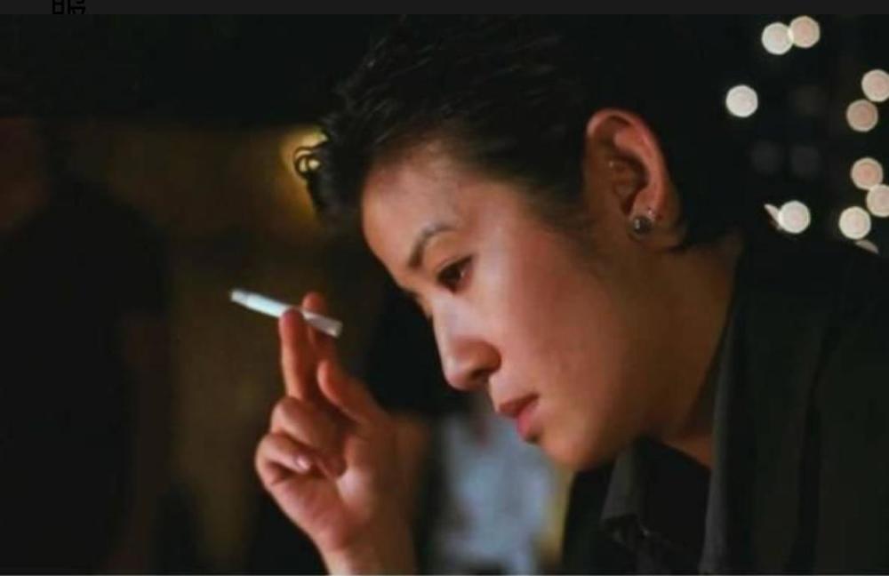 她是崩牙驹真正的靠山,也是红兴13妹的原型,自己婚姻