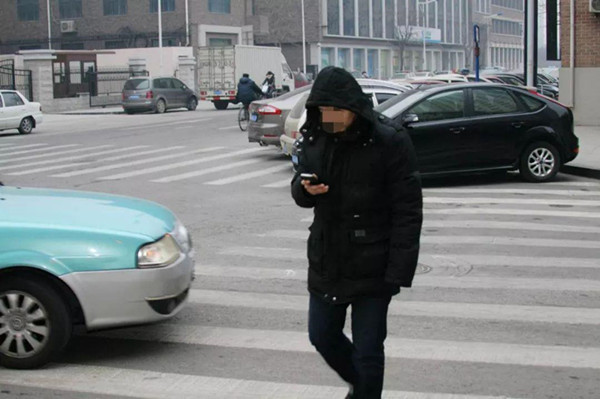 焦文军和马俊落网记利用地下通道害人导致多名玩手机路人丧命