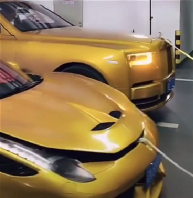 用张越的法拉利和劳斯莱斯去拍视频车头处牵绳现场拉着走