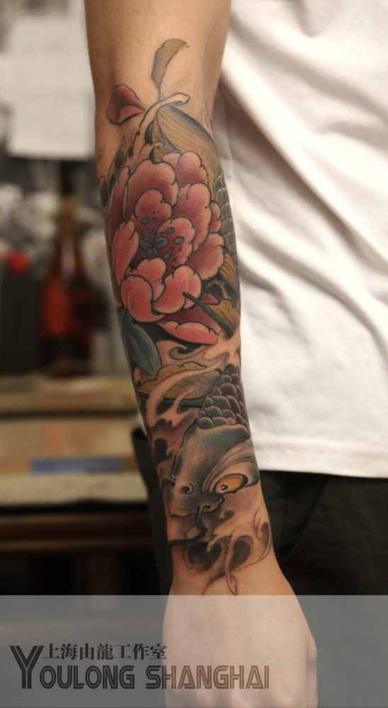 由龙纹身作品小臂纹身图案