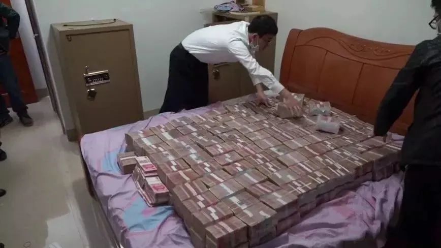 4700万元现金铺满床!50万人参与的网络传销案在百色开庭
