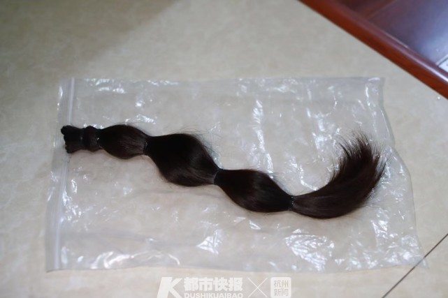 最美笑容二年级女生一把剪掉齐腰长发竟是为了做这件事