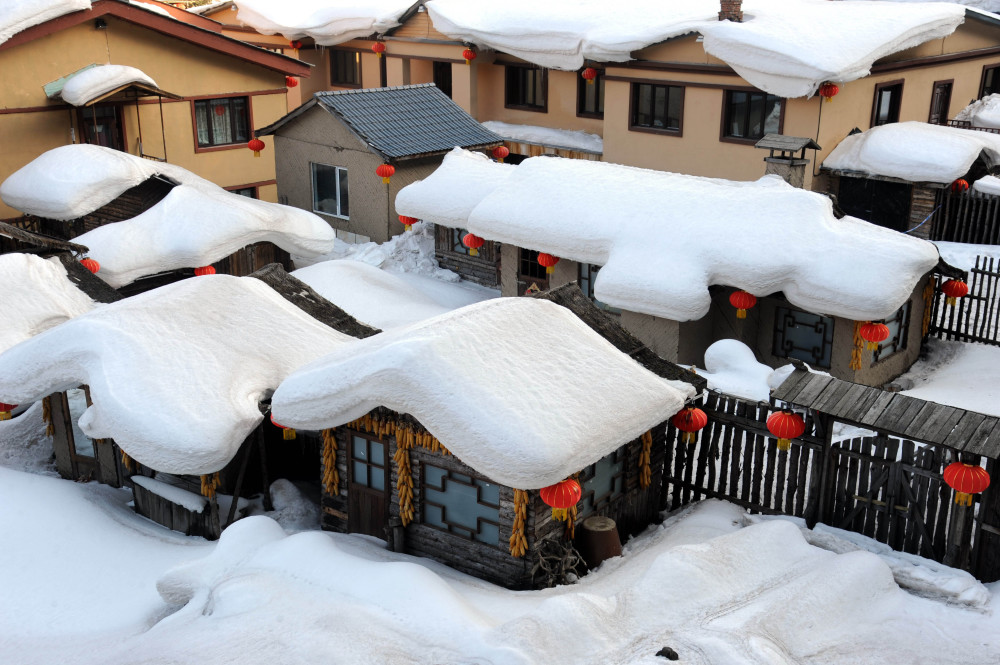 百家媒体人走进雪乡共话发展