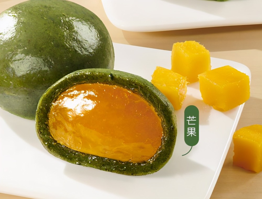 甜橙青团,芒果青团:以水果味道做馅料,这种青团是比较有特色的,将青草