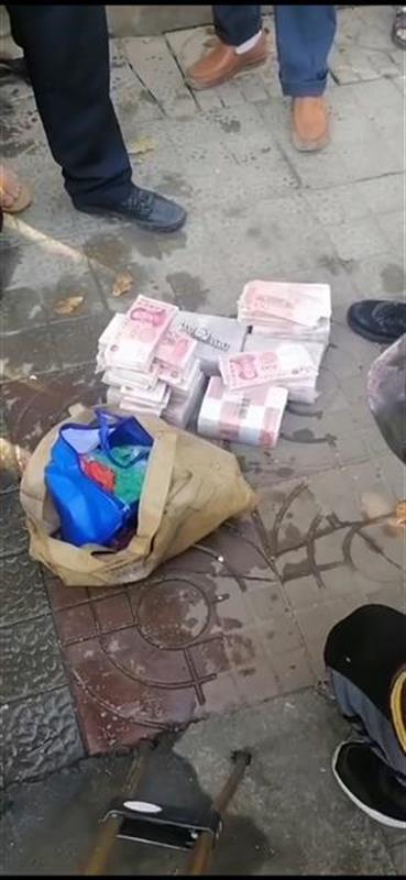 环卫工人从河中捞出65万元现金,来源成迷,警方介入调查