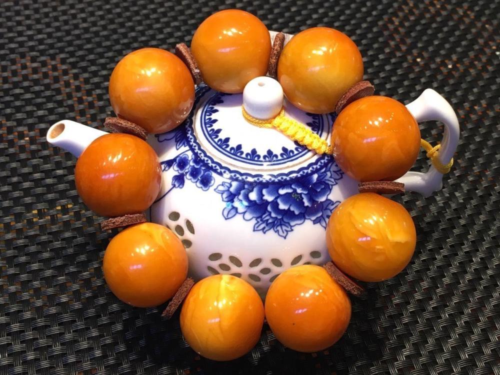 文玩市场上的烤色蜜蜡为什么那么多?不是商家心狠,而是消费需求