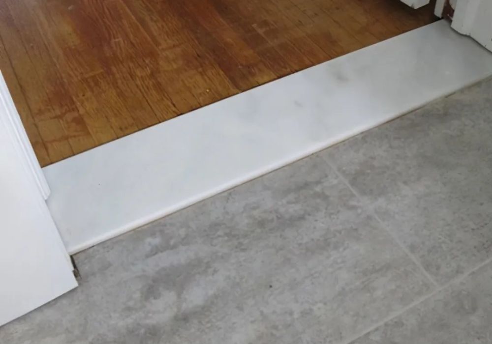 门槛石要不要装入住2年客厅地板被泡烂老师傅说原因在它