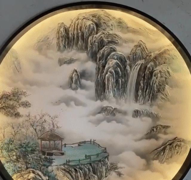 其实是浮雕壁画.看起来是不是像一幅国画?