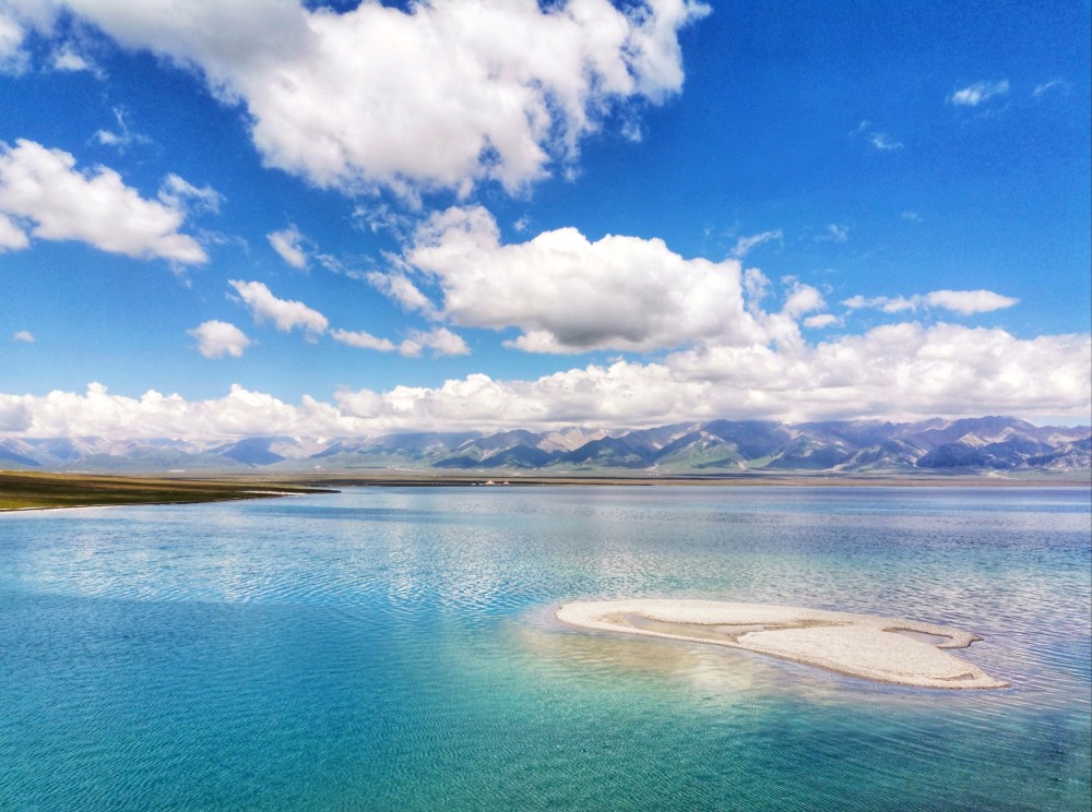 峡谷感受雨水冲刷出的奇迹,然后沿着101省道,寻找小众旅行的玛纳斯湖