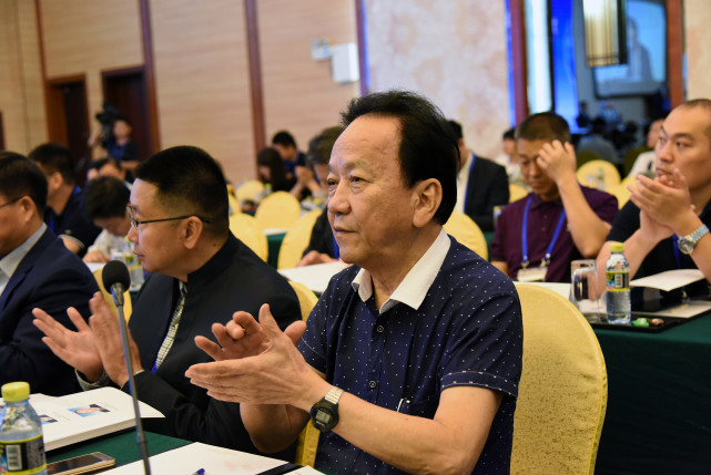 2019年10月25日,彼时已年近80岁的王光兴在海口参加论坛.