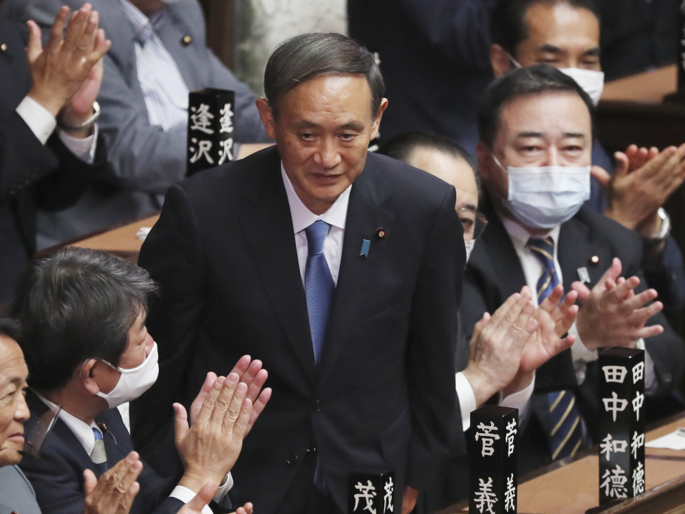 美日又在搞小圈子菅义伟献花阿灵顿公墓还有两副面孔