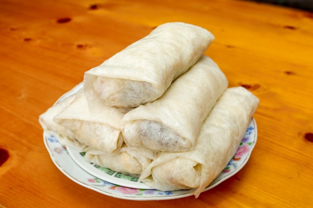 饼皮薄如蝉翼这道梅州大埔县驰名小吃传承至今已有200多年历史