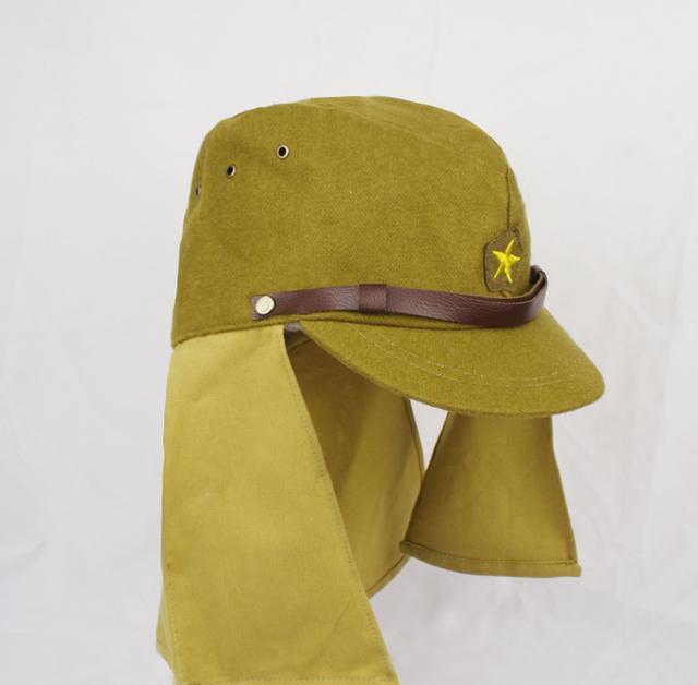 鬼子兵帽子上两块猪耳朵一样的布片干啥用的看起来好滑稽