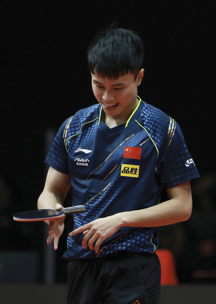 (体育)乒乓球——"直通wtt大满贯·世乒赛":周启豪男单夺冠(2)