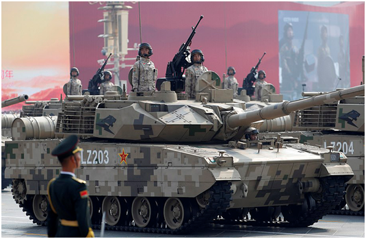 采访时表示,解放军集中"上新"是我国国防现代化建设的成果,武器装备的