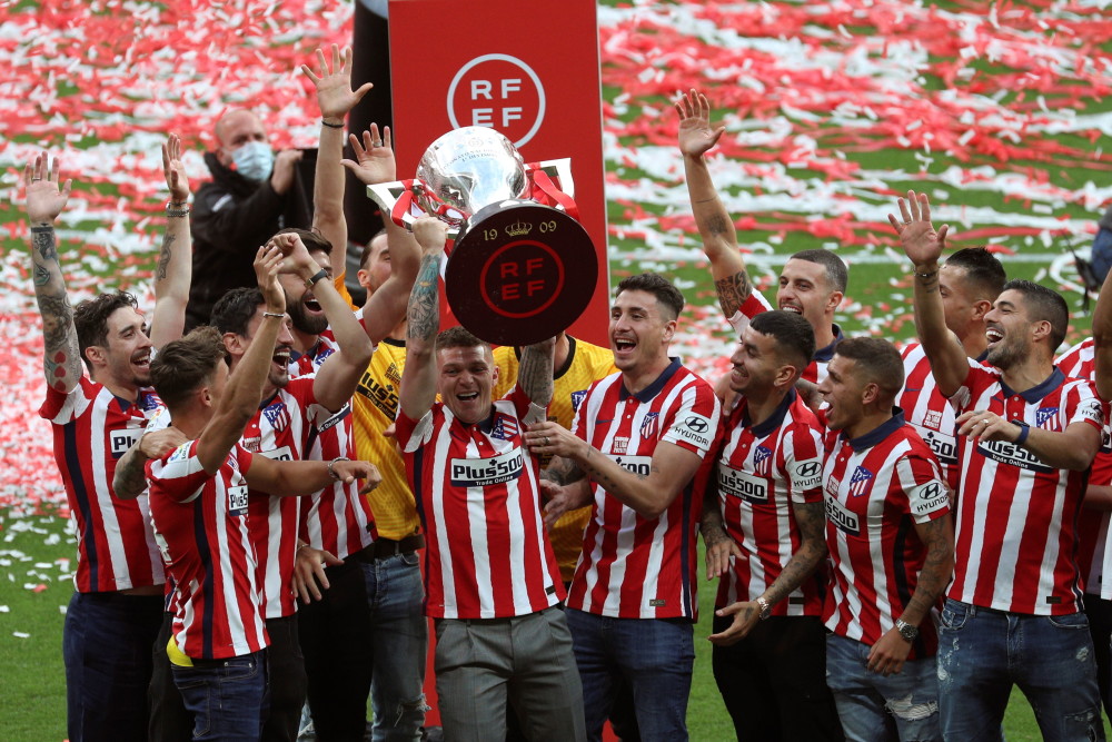 外代二线足球西甲马竞庆祝夺冠