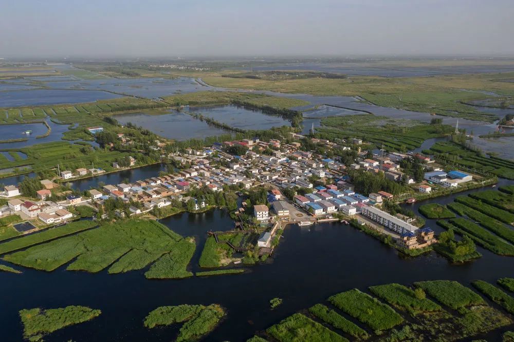 新华社:雄安调蓄库建成后将形成7000亩水面,相当于大型水库!_腾讯新闻