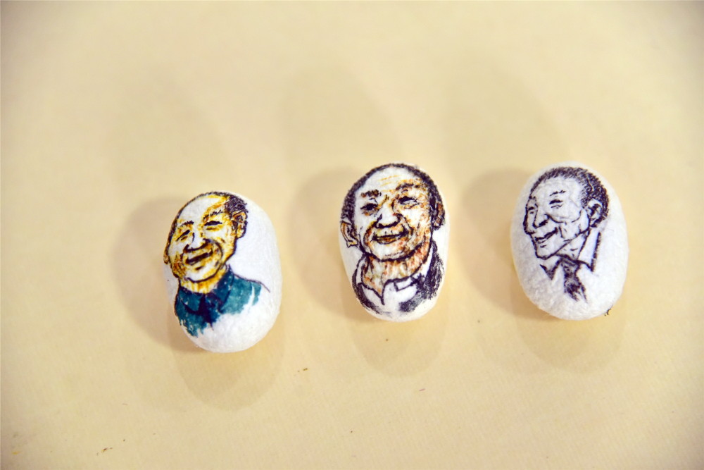西樵画家用10个蚕茧,画出袁隆平院士生平照_腾讯新闻
