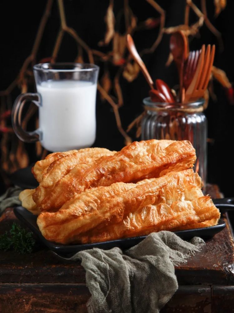 涨知识!吃了这么多年的油条,非得两根一起炸的原因竟是