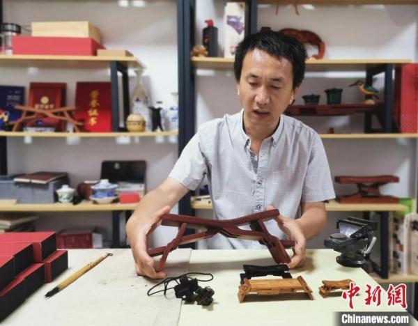 山东工匠在创新中传承千年鲁班枕绝技
