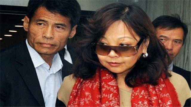 张子强伏诛后老婆罗艳芳打扮艳丽出门游玩却被四名匪徒盯上