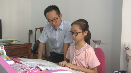 文明家庭黄锦文邓惠如家庭梦想添翼以爱引航