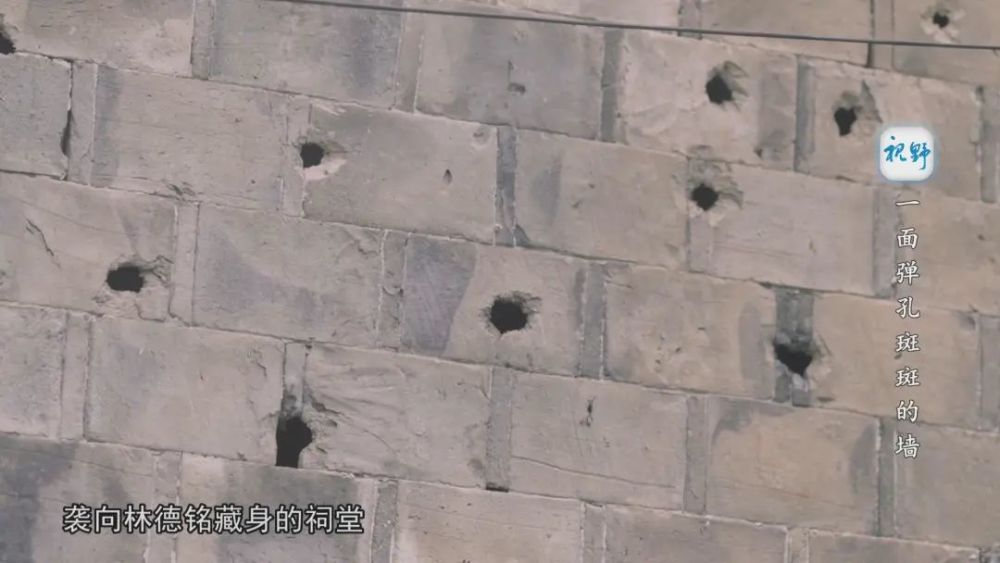 视野一面弹孔斑斑的墙