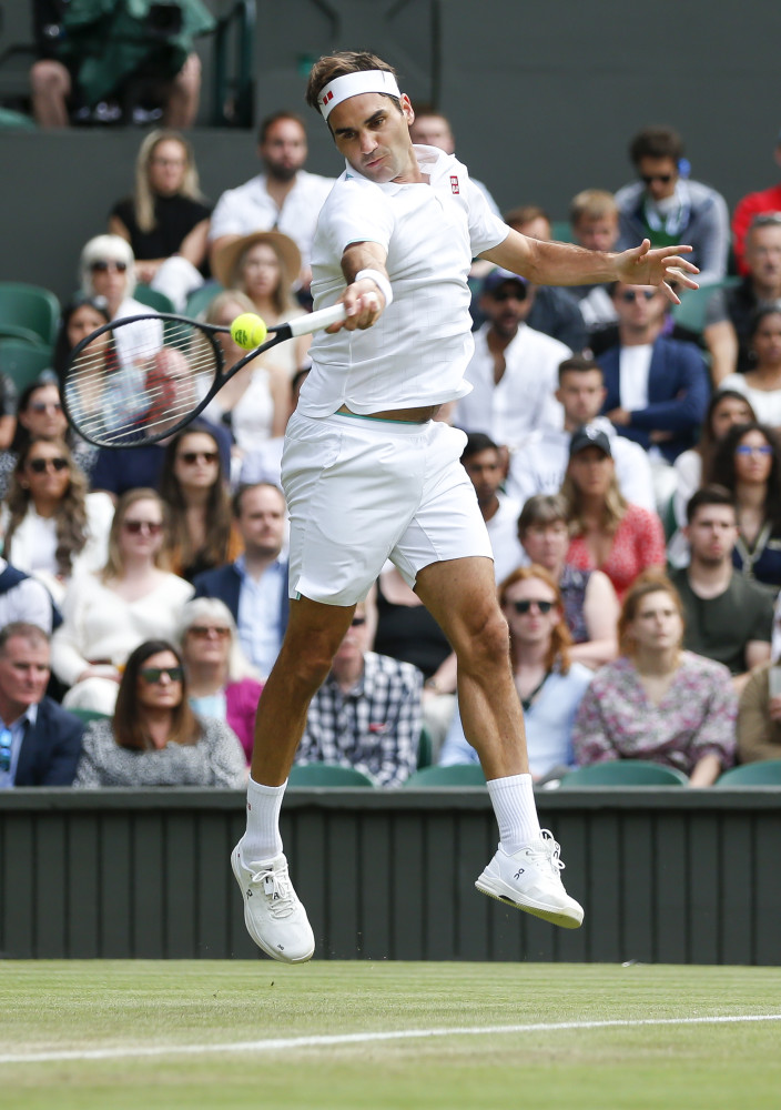 (体育)网球——温网:费德勒晋级第三轮