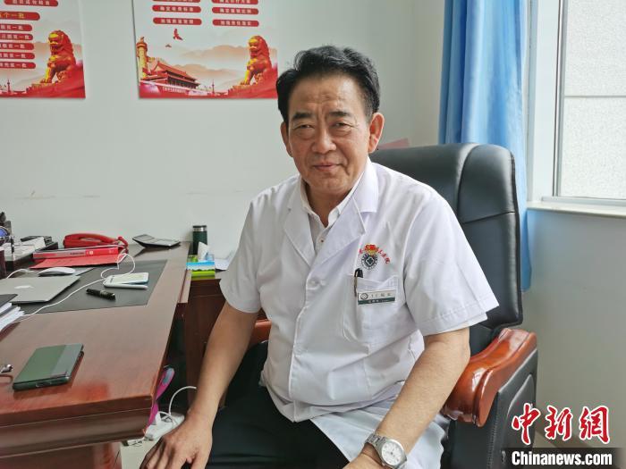 图为王学生. 李爱平 摄