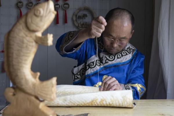 守望太阳的赫哲族 唱响幸福小康“新船歌”