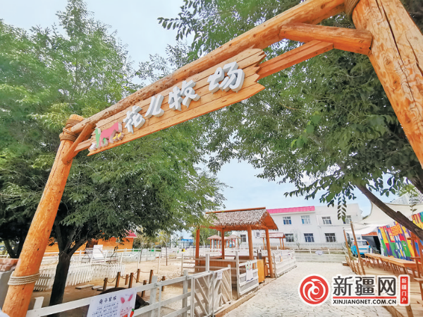 图为乌鲁木齐县永丰镇上寺村花儿牧场已经修建完毕.