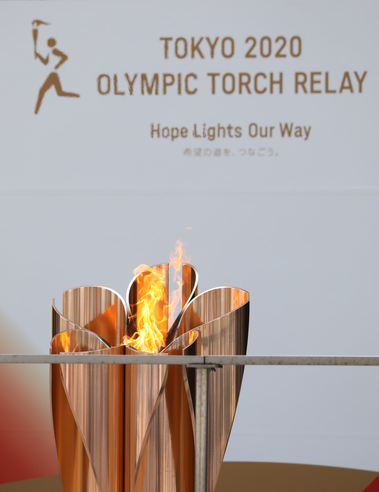 (东京奥运会)东京都举办圣火抵达仪式
